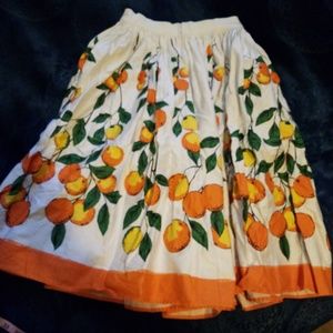 Pinup couture jenny skirt in orange boarder print